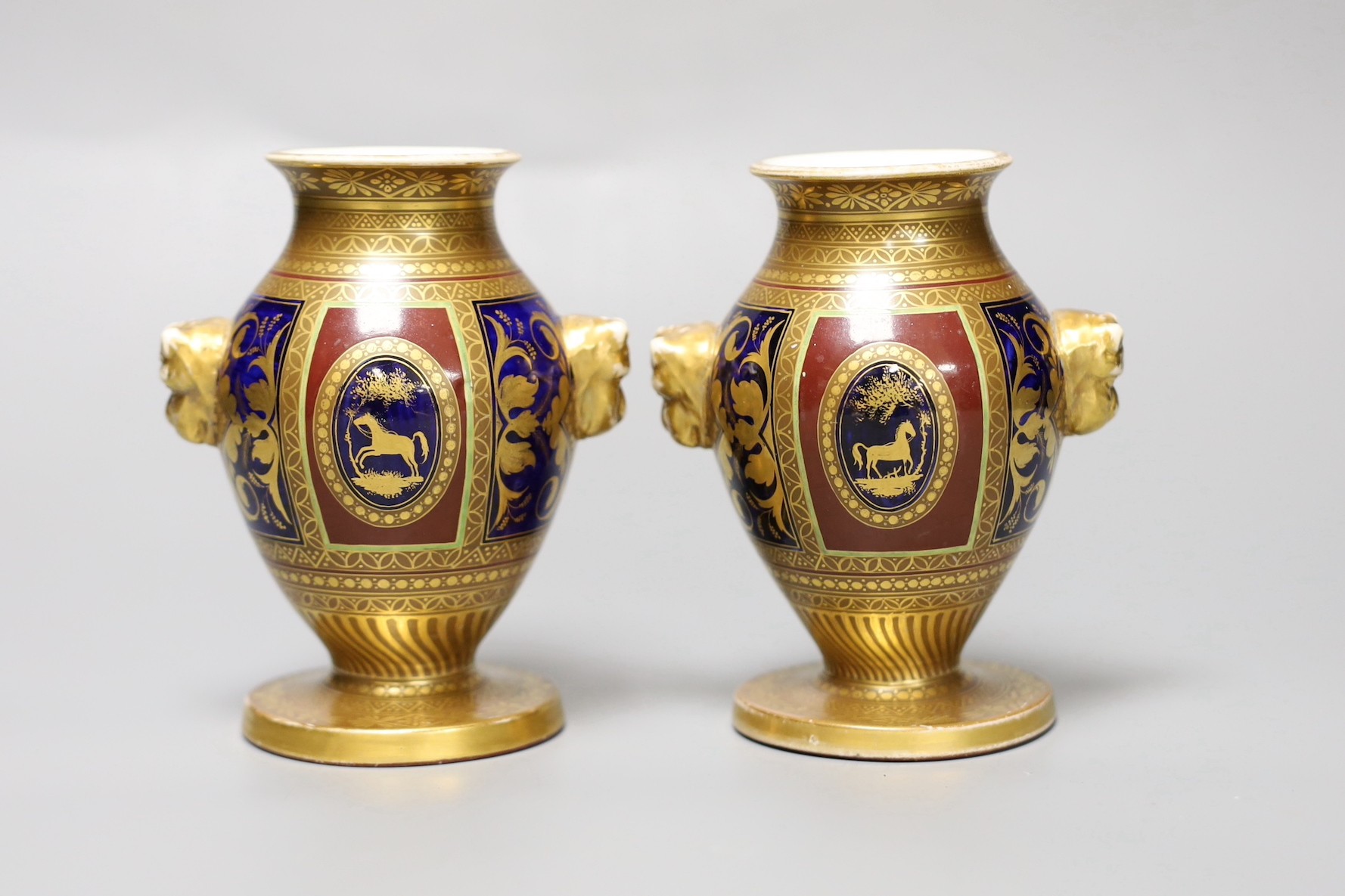 A pair of Paris porcelain two handled vases, first half 19th century, 12cm